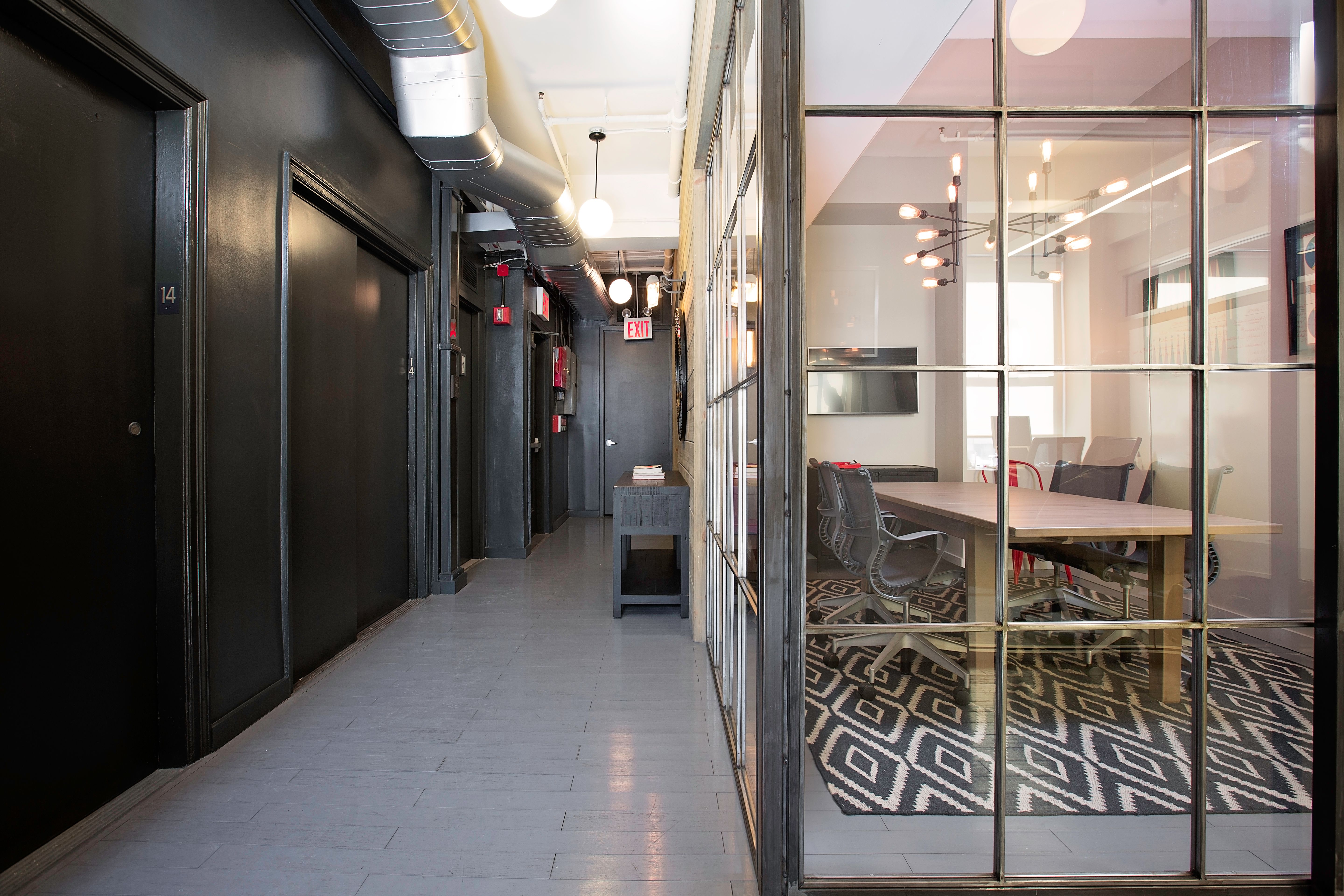 Stylish Meeting Room Space with TV - View 3